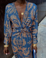 Dineke - Elegant dress with long sleeves and floral print