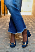 DECOLLETE WITH BUCKLE AND WIDE HEEL