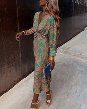 Dineke - Elegant dress with long sleeves and floral print