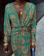 Dineke - Elegant dress with long sleeves and floral print