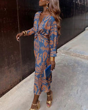 Dineke - Elegant dress with long sleeves and floral print
